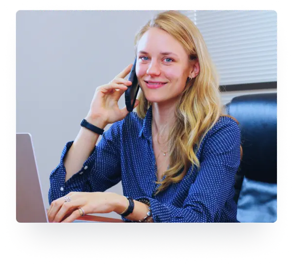 Professional talking on the phone at a desk during a FlameOFF Lunch and Learn program